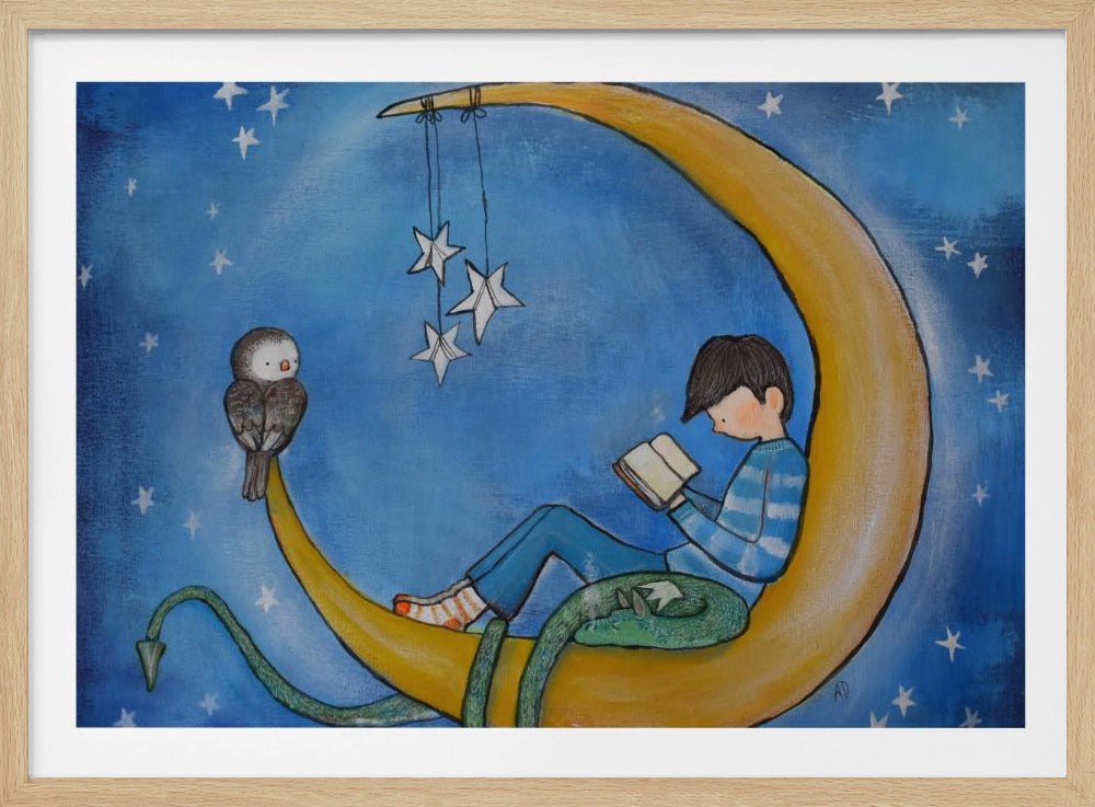 A whimsical illustration of a young boy reading a book while sitting on a large yellow crescent moon. He is accompanied by a small owl and a sleeping green dragon-like creature, against a starry blue night sky. The artwork is set in a silver frame. Decor