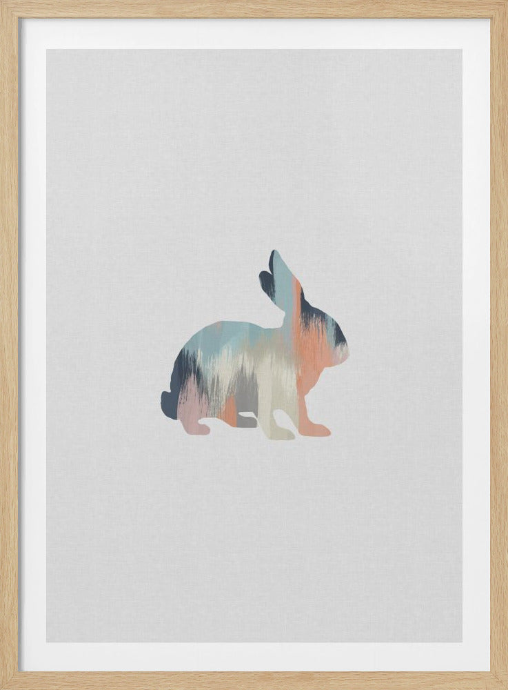 A framed modern art piece featuring a silhouette of a rabbit against a light gray, textured background. The rabbit's form is filled with an abstract, painterly design of vertical brushstrokes in muted tones of blue, peach, navy, and cream. The artwork is enclosed in a simple black frame. Decor