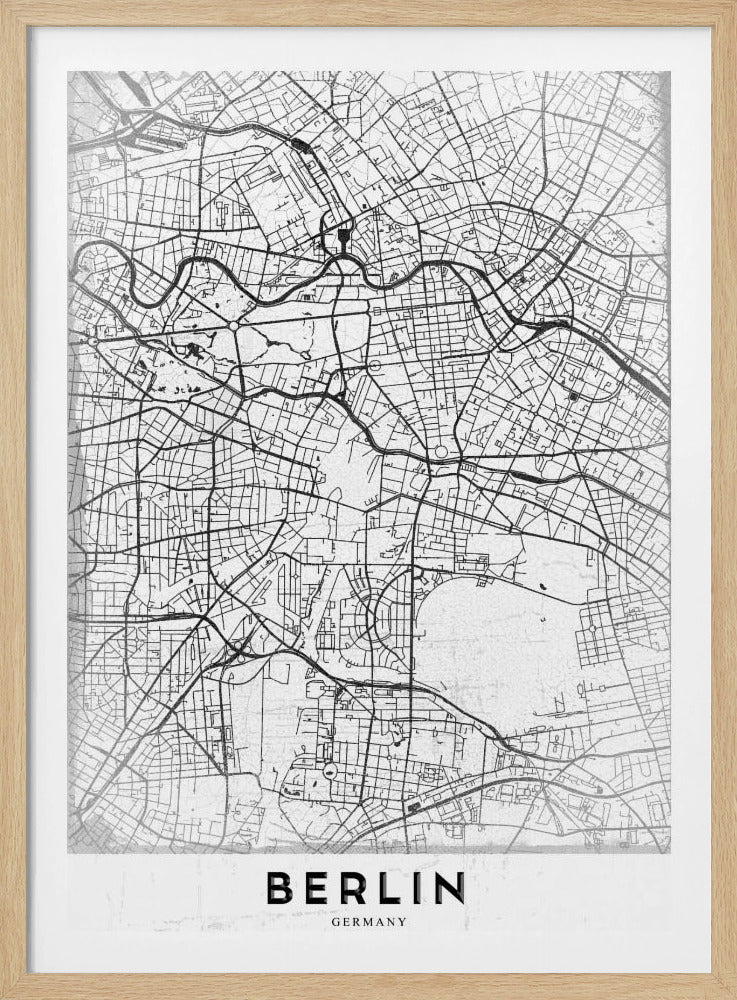 A minimalist black and white poster of a street map of Berlin, Germany. The map's intricate network of roads and waterways is depicted with black lines on a white, slightly textured background. The artwork is enclosed in a simple black frame, with the word 'BERLIN' printed in bold, black capital letters at the bottom center. Wall Art