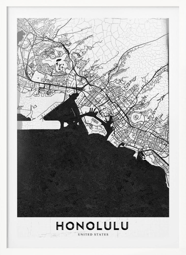 A framed, minimalist black and white map of Honolulu, Hawaii. The city's streets and coastline are rendered in black lines on a white background, while the ocean is a solid, textured black. The word 'HONOLULU' is printed in black sans-serif font at the bottom. Artwork