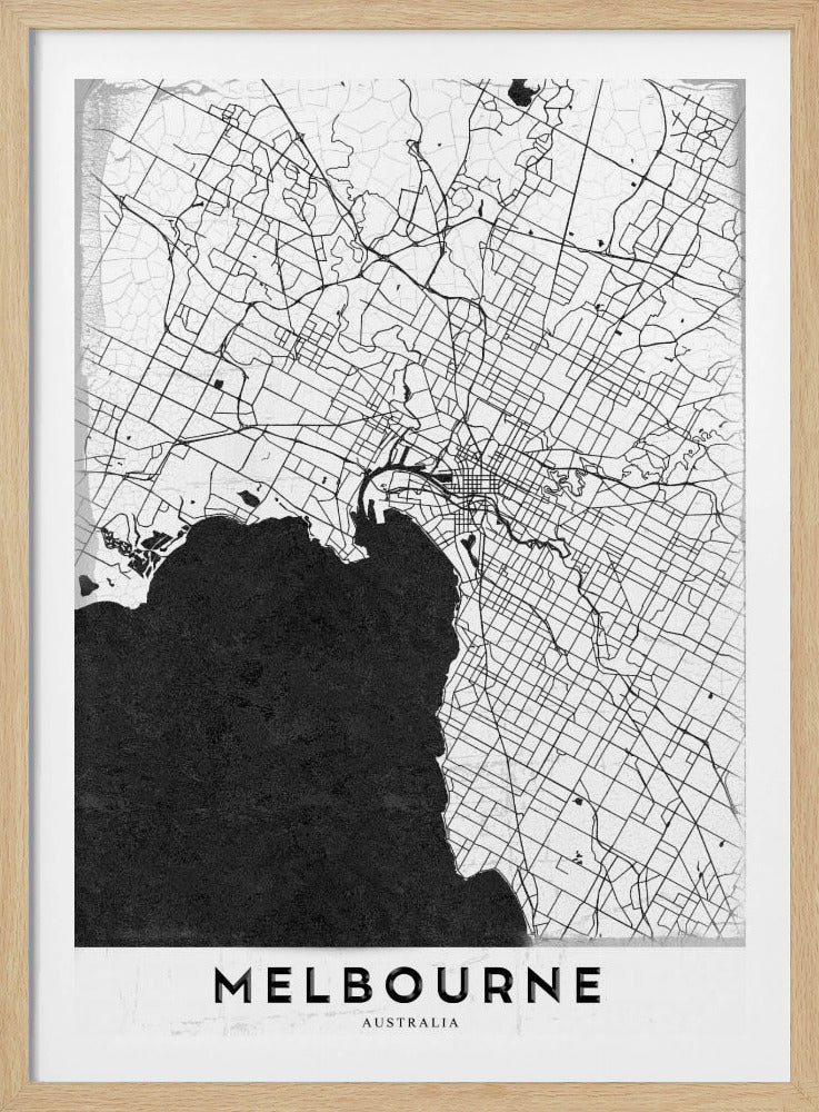A minimalist black and white map of Melbourne, Australia, presented in a black frame. The city's road network is depicted with fine black lines on a textured white background, while the adjacent bay is shown in solid, textured black. The name 'MELBOURNE' is written in a bold, black font at the bottom. Poster