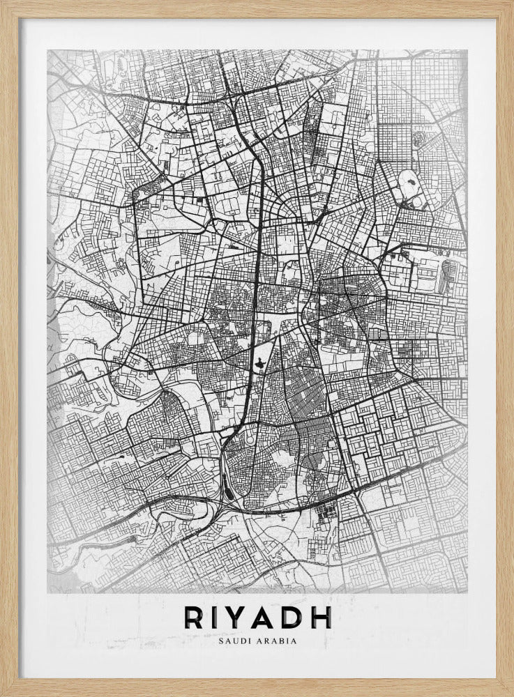 A minimalist, black and white framed poster of a city map of Riyadh. The map details the intricate network of streets and city blocks in black lines on a textured, light gray background. At the bottom, the word 'RIYADH' is printed in a bold, black, sans-serif font. Wall Art