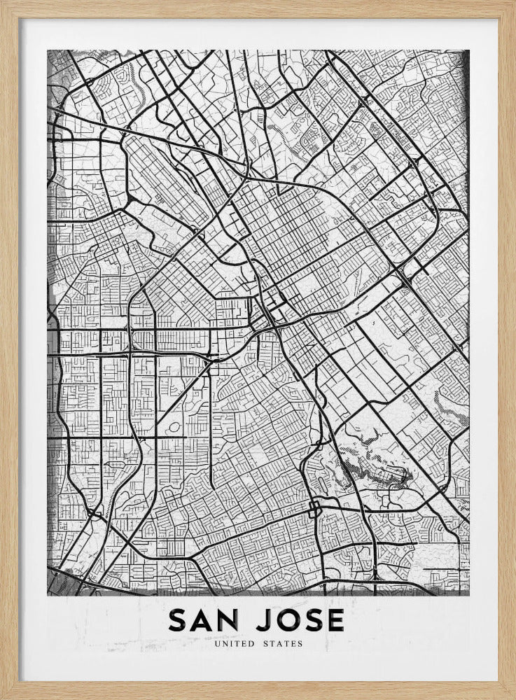 A minimalist black and white street map of San Jose, California, presented as a framed poster. The map details the city's grid, highways, and roads in black lines on a slightly textured white background. The text 'SAN JOSE' is written in a bold, black, sans-serif font at the bottom. Wall Art