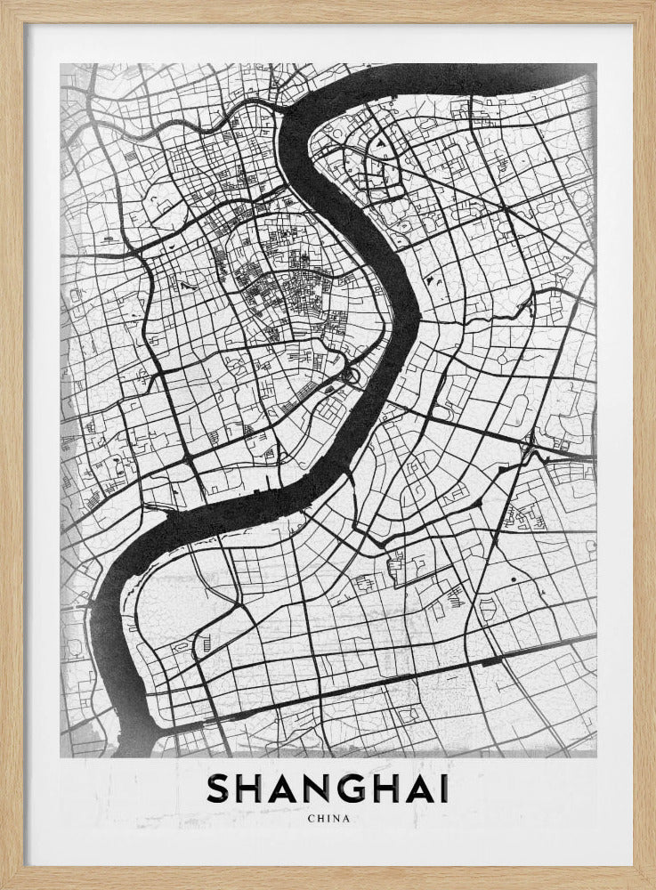A minimalist black and white street map of Shanghai in a black frame. The map highlights the city's road network and the prominent Huangpu River, with the name 'SHANGHAI' printed at the bottom. Decor