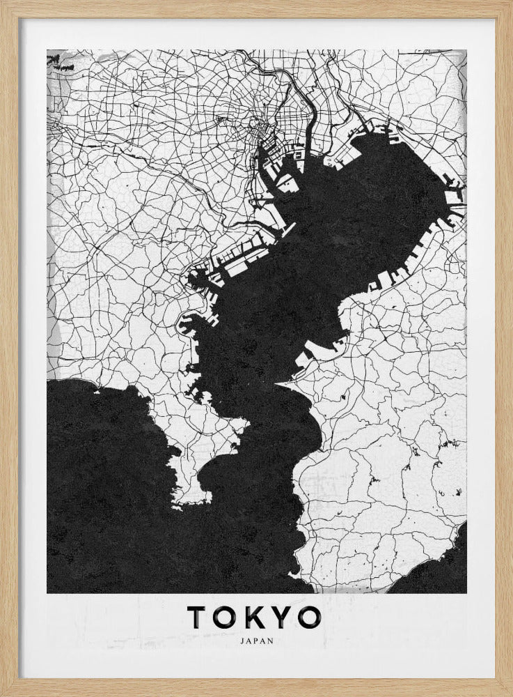 A minimalist black and white map of Tokyo, Japan, in a black frame. The map shows the city's road network in thin black lines on a white background, while Tokyo Bay and other water bodies are depicted in solid black. A white banner at the bottom contains the word 'TOKYO' in a clean, sans-serif font. Wall Art