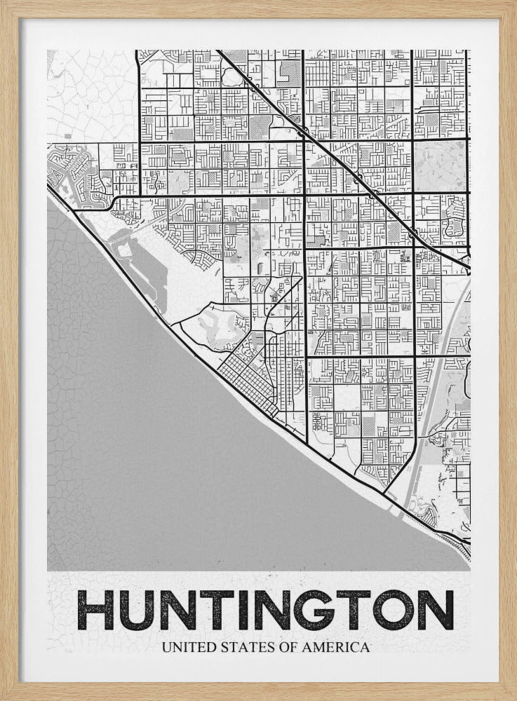A minimalist black and white framed map of Huntington. The map details the city's street grid next to the coastline, with the name 'HUNTINGTON' printed in bold block letters at the bottom. Print