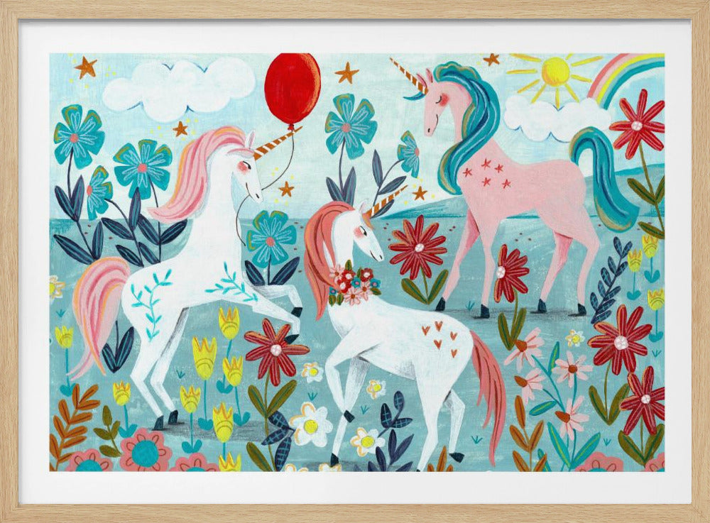 A whimsical illustration of three unicorns in a vibrant field of flowers. One white unicorn with a pink mane holds a red balloon, another white unicorn wears a flower wreath, and a large pink unicorn with a blue mane stands in the background under a sun and a small rainbow. Print