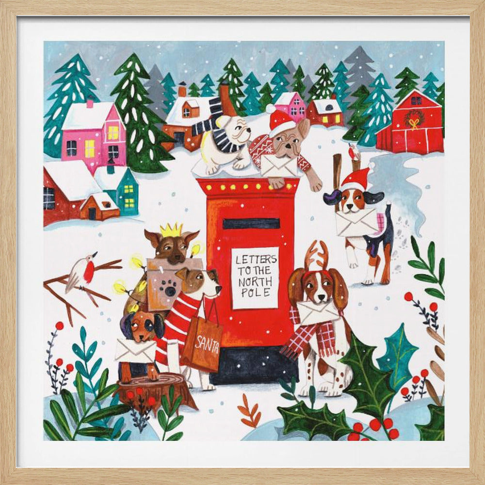 A whimsical Christmas illustration of several dogs in festive hats and scarves mailing letters at a bright red postbox labeled 'Letters to the North Pole' in a snowy village scene with colorful houses and pine trees. Decor