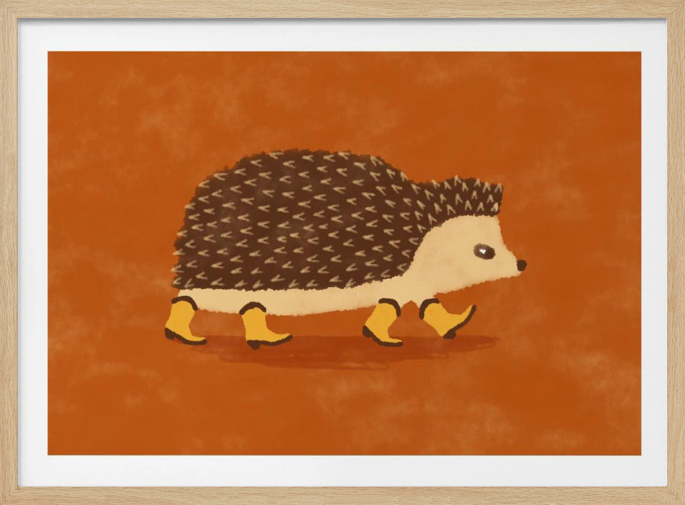 A whimsical illustration of a brown and cream hedgehog walking to the right while wearing tiny yellow boots on all four feet. The background is a solid, textured brownish-orange, and the artwork is enclosed in a silver frame. Wall Art