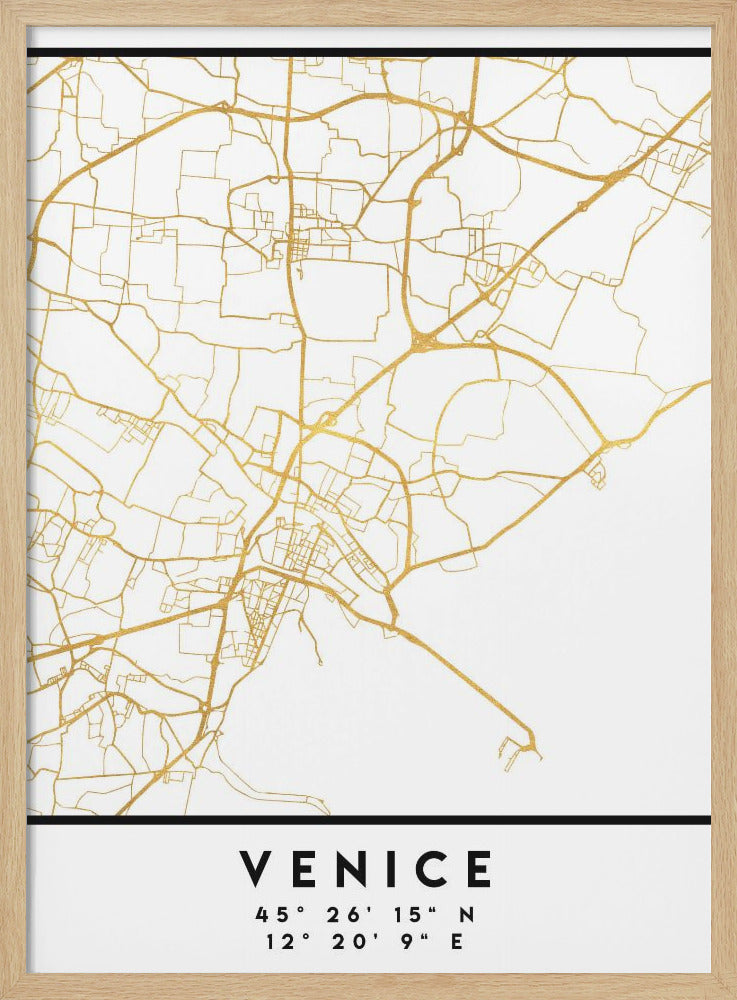 A modern, minimalist map of Venice, Italy, rendered in gold foil on a crisp white background. Below the map, the name 'VENICE' and its geographical coordinates are printed in a bold black font. The entire piece is enclosed in a simple black frame. Artwork