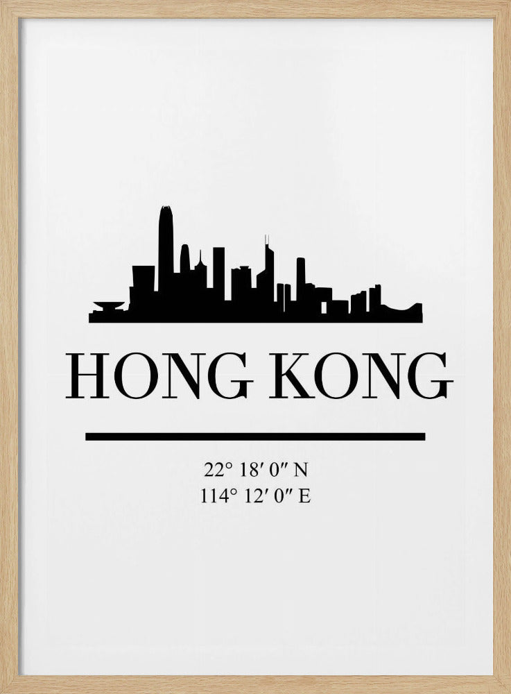 A minimalist black and white framed poster of Hong Kong. It features a black silhouette of the city's skyline at the top. Below the skyline, the text 'HONG KONG' is printed in a large, black serif font. Underneath the city name is a horizontal line, followed by its geographical coordinates: 22° 18' 0" N and 114° 12' 0" E. Poster
