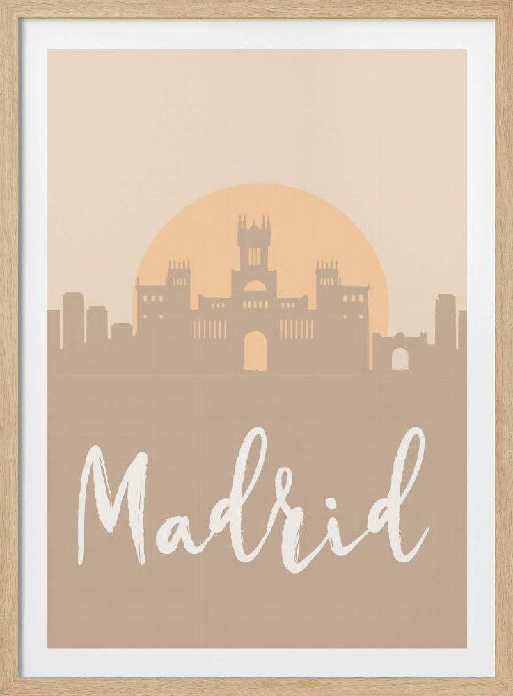 A minimalist art print of the Madrid skyline, depicted as a brown silhouette against a cream background with a large, pale orange sun. The word 'Madrid' is written below in a white, flowing script font. The print is shown in a black frame. Poster
