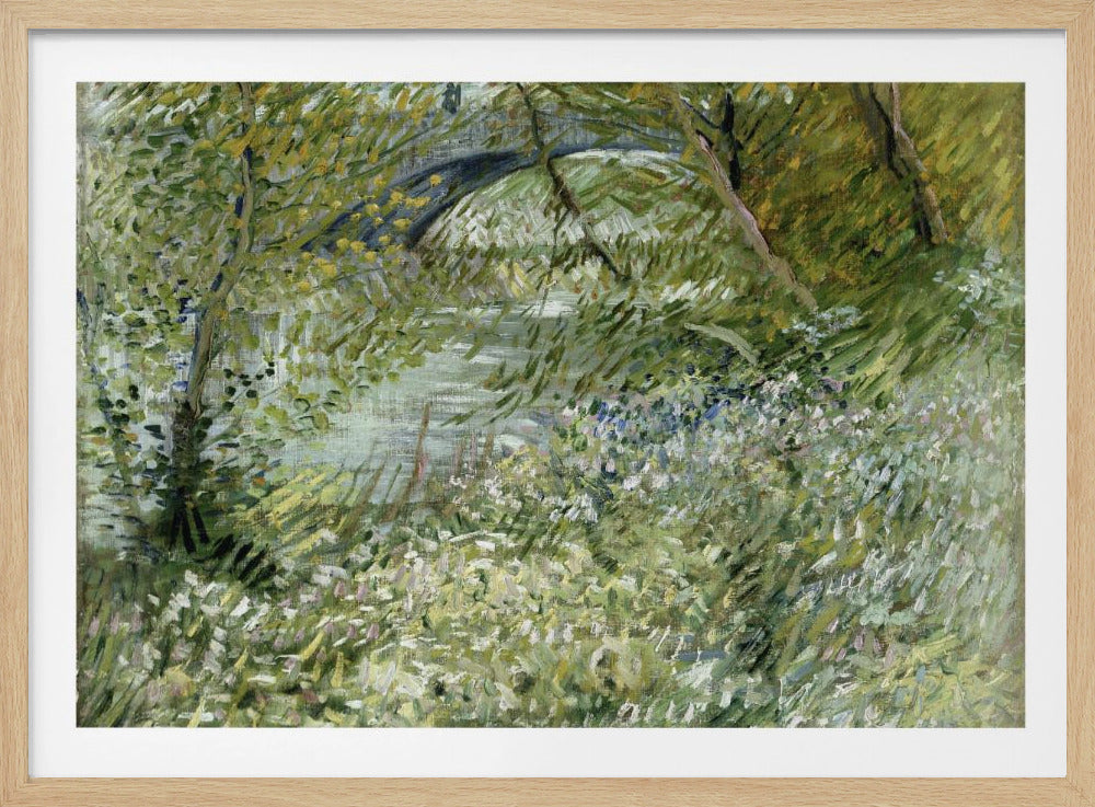A framed impressionist painting by Vincent van Gogh, depicting the banks of a river. The scene is lush with green foliage and trees. In the foreground, white and blue flowers bloom in the tall grass. A bridge is partially visible in the background through the leaves. The brushwork is energetic and textured. Print