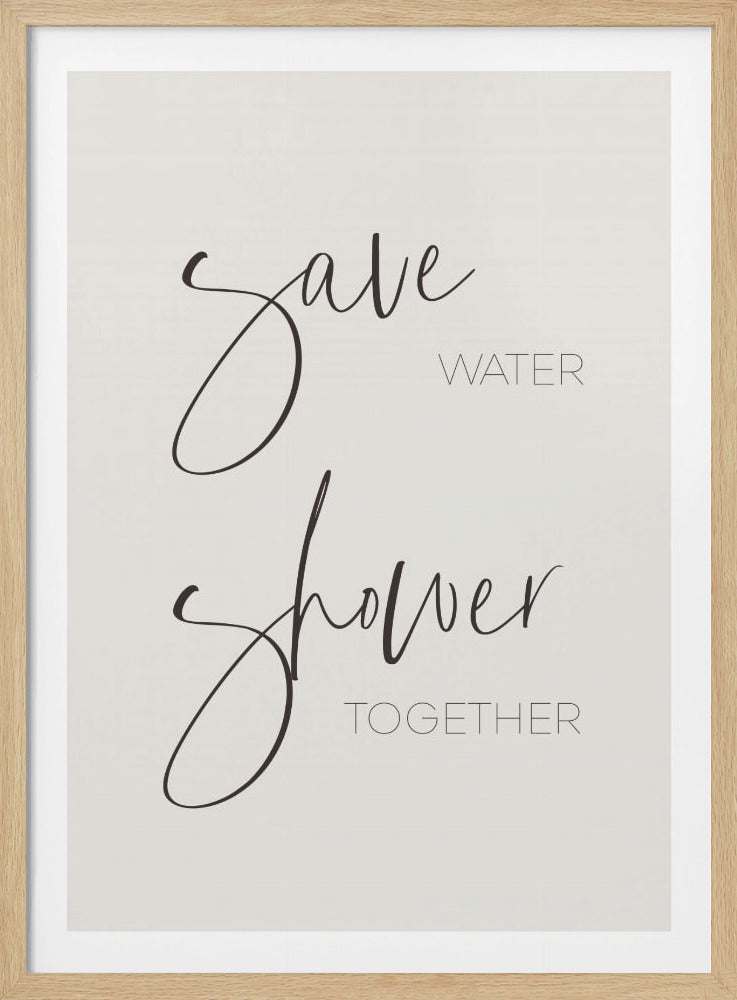 A minimalist art print in a black frame with the phrase 'Save Water Shower Together'. The words 'Save' and 'Shower' are in a large, elegant dark brown script, while 'Water' and 'Together' are in a smaller, simple sans-serif font against a light cream background. Print