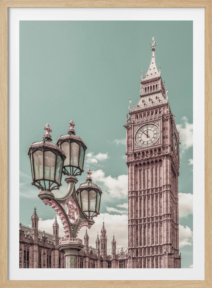 A stylized, low-angle photograph of Big Ben in London, with an ornate Victorian lamppost in the foreground. The image is color-graded with a pale teal sky and pink-toned architecture, creating a vintage, dreamy aesthetic. Wall Art