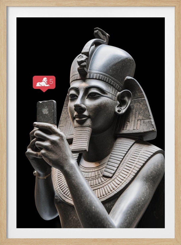 A humorous digital artwork depicting a detailed, dark grey stone bust of an ancient Egyptian pharaoh holding a modern smartphone and looking at it with a slight smile. A red social media notification with a sphinx icon and the number 5 floats next to the phone against a solid black background. Wall Art
