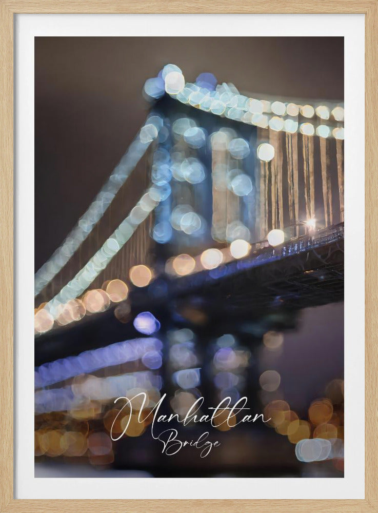 An artistic, out-of-focus photograph of the Manhattan Bridge at night, featuring a strong bokeh effect with large circles of blue and warm white light against a dark sky. The words 'Manhattan Bridge' are written in a white script font at the bottom. Print
