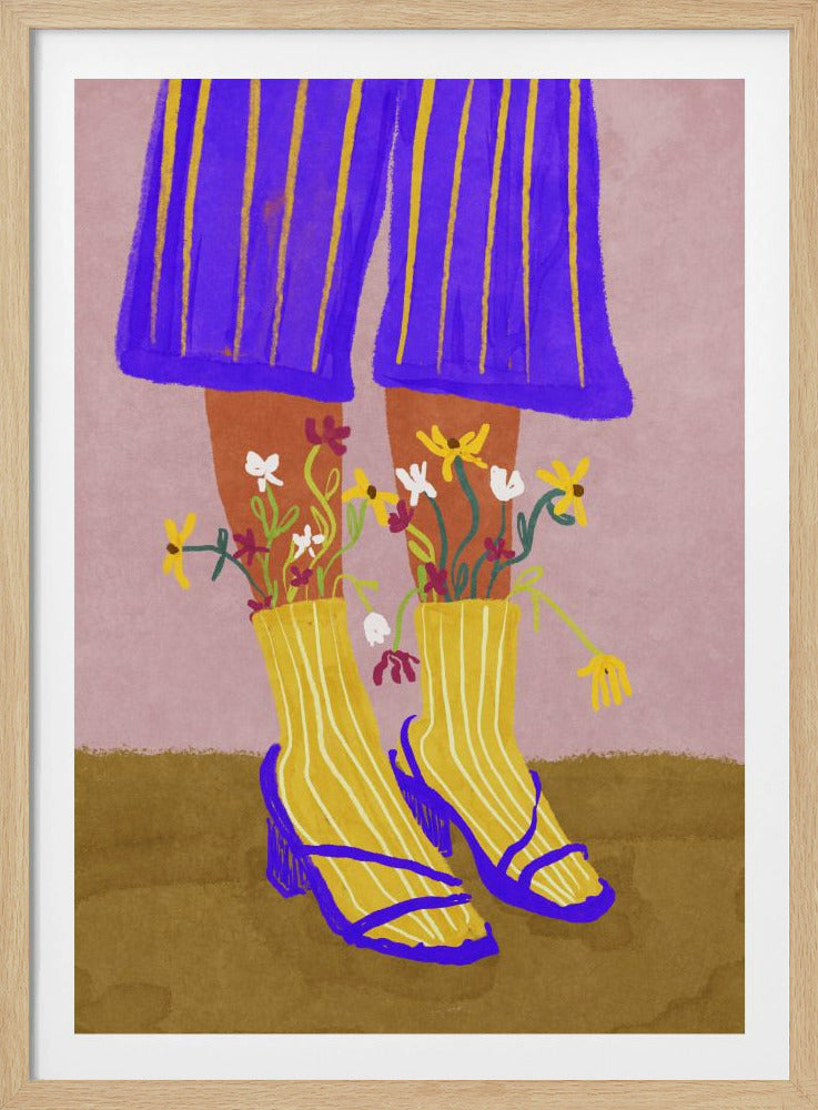 A stylized, colorful illustration focusing on the lower legs and feet of a person wearing vibrant clothing. They have on wide-legged, royal blue trousers with vertical yellow stripes, and yellow socks with white stripes. Small, colorful wildflowers sprout from the tops of their socks. They are wearing bright blue strappy heeled sandals. The background is a soft pink color with a brown floor. Wall Art