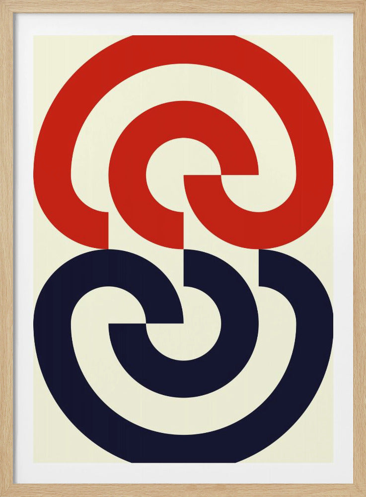 A framed modern abstract art piece featuring two interlocking geometric shapes on a cream background. The top shape is a bold red spiral, and the bottom shape is an identical dark blue spiral, creating a symmetrical and balanced composition. Artwork