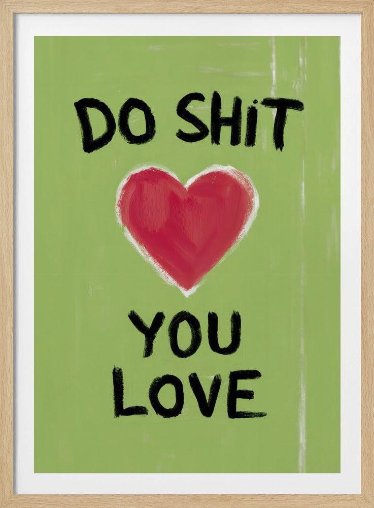 A framed modern art print with a light green background featuring the motivational phrase 'DO SHIT YOU LOVE' in black, hand-painted letters. A large, stylized red heart is painted between the top and bottom lines of text. Print