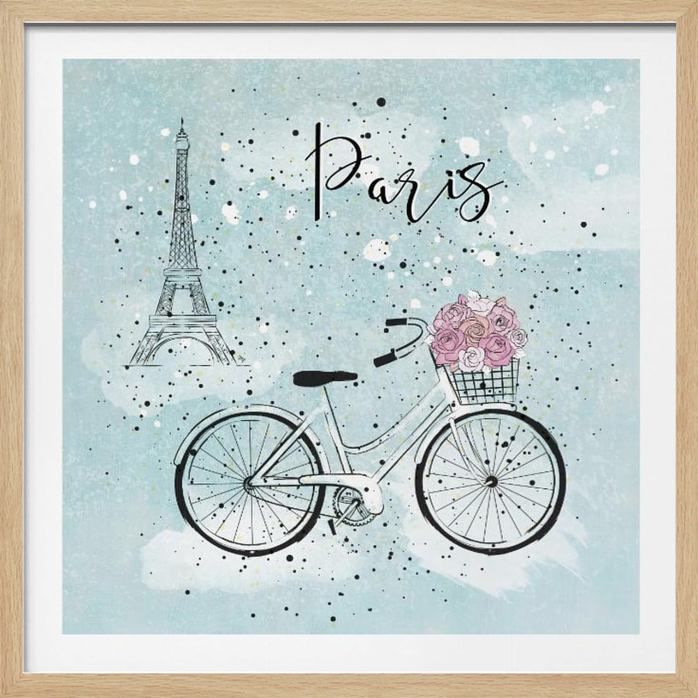 A whimsical illustration of Paris featuring a line drawing of a bicycle with a basket of pink roses in the foreground and the Eiffel Tower in the background. The word 'Paris' is written in cursive script against a speckled, light blue watercolor background, all enclosed in a light wood frame. Decor