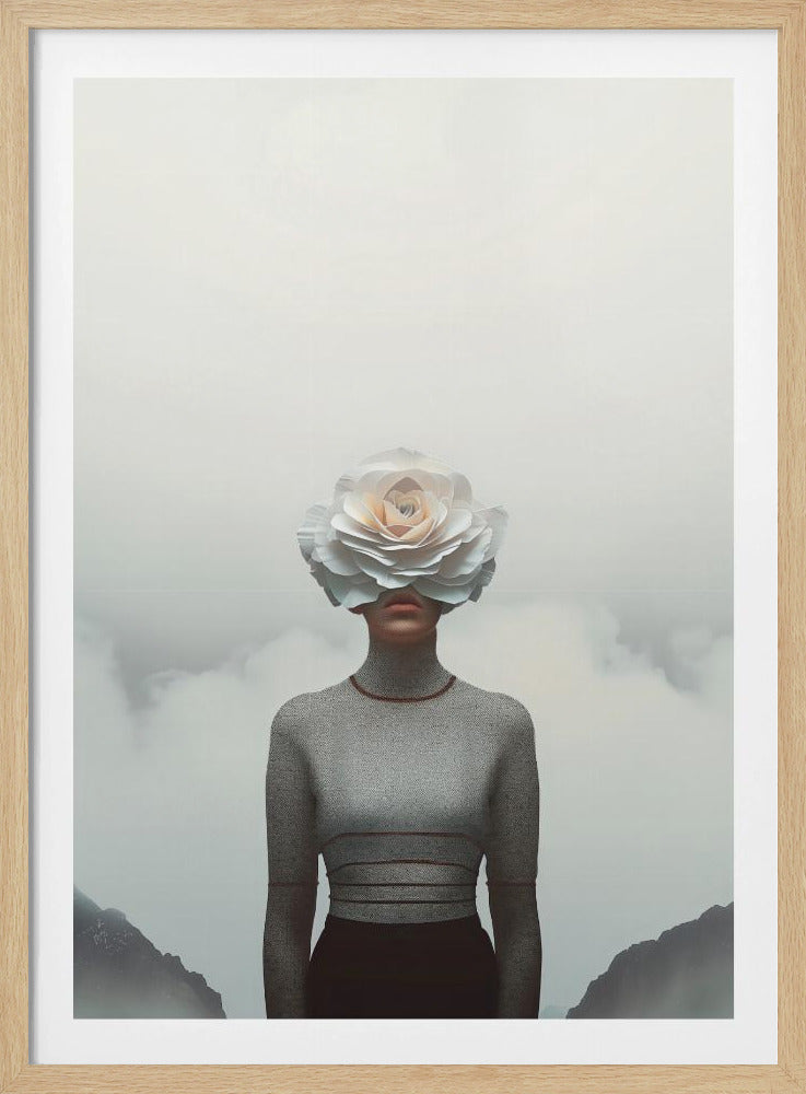 A surrealist portrait of a person from the waist up, their face completely covered by a large, white paper rose. They are wearing a grey turtleneck sweater and stand in front of a foggy, mountainous landscape under a pale grey sky. Poster