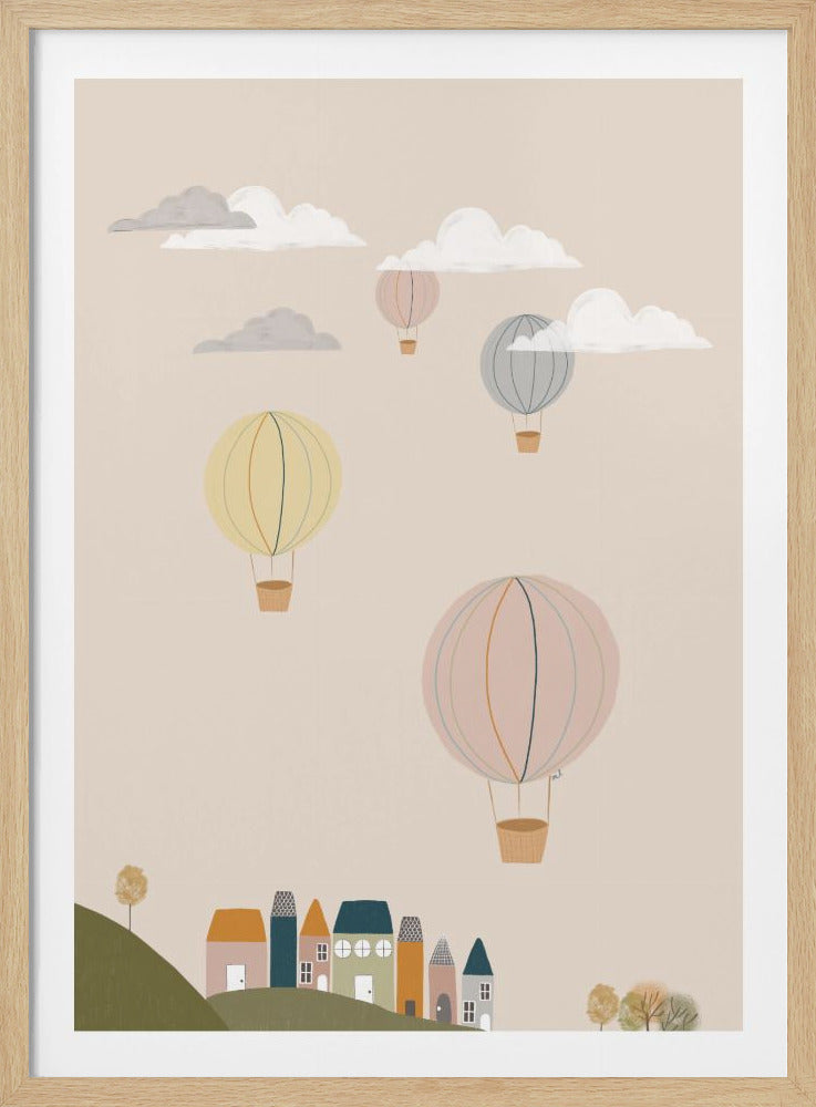 A charming illustration of several hot air balloons in soft pastel colors floating in a beige sky over a whimsical village. The balloons are yellow, pink, and grey, drifting amongst white and grey clouds. Below, a row of quaint, colorful houses rests on a green hill. Decor