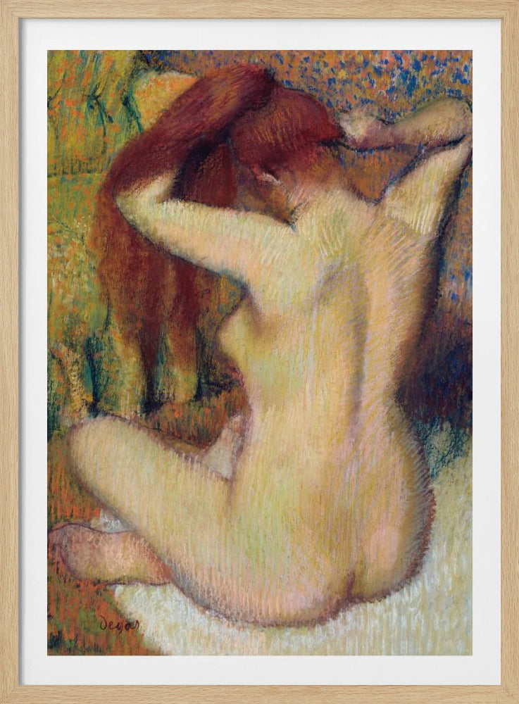An impressionist pastel painting by Edgar Degas of a nude woman seen from the back. She is sitting on a light-colored surface, gathering her long, auburn hair with both hands behind her head. The background is a textured blend of green, yellow, and blue colors. Poster