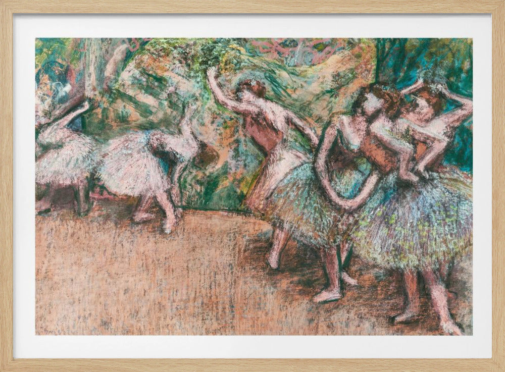 An Impressionist painting by Edgar Degas of ballet dancers on a stage against a green and orange backdrop. The dancers, in various poses, wear tutus in shades of white, pink, and light green. The artwork is framed in a simple silver frame. Artwork