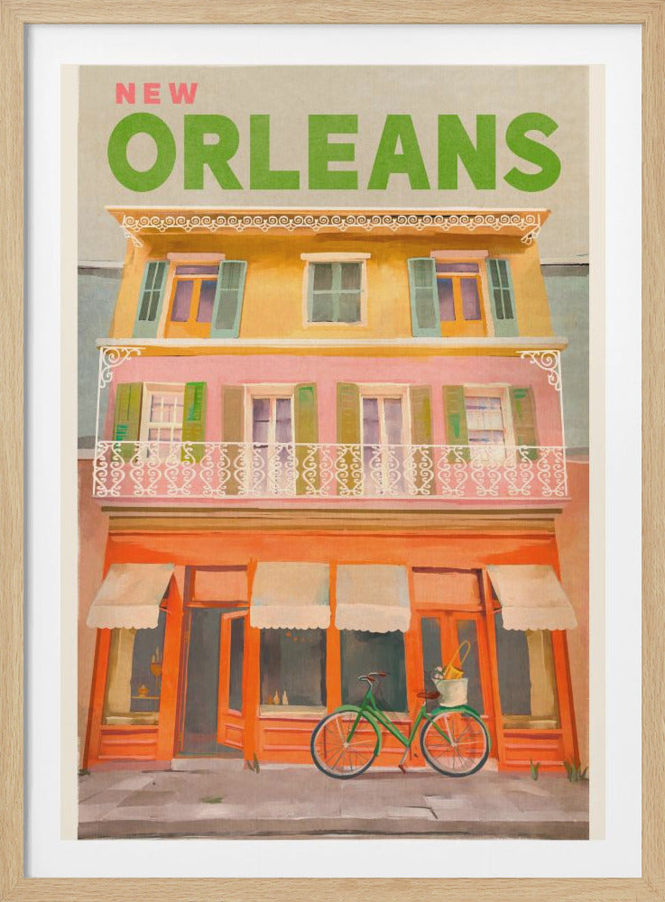 A vintage-style travel poster for New Orleans featuring a colorful three-story building. The top of the poster has 'NEW ORLEANS' in large green letters. The building is painted yellow, pink, and orange, with green shutters and a white wrought-iron balcony. A green bicycle is parked on the sidewalk in front of the building's storefront. Decor