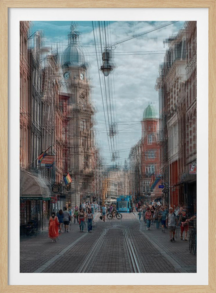 A motion-blurred, dreamlike photograph of a busy street in Amsterdam. Historic buildings line the cobblestone road, which is filled with pedestrians and features tram tracks. A prominent clock tower rises against a cloudy blue sky, and the entire scene has a shaky, layered effect. Poster