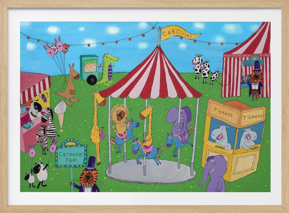 A whimsical and colorful illustration of an animal carnival. A red-and-white striped carousel is in the center, with a lion, giraffe, and elephant riding it. Surrounding the carousel are other cartoon animals, including hippos in a ticket booth, a tiger ringmaster, a kangaroo with balloons, and a family of cows, all on a green field under a blue sky. Wall Art