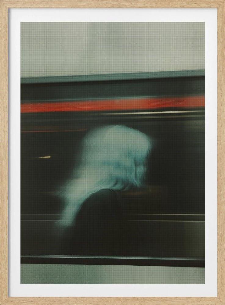 An abstract photograph with motion blur, featuring the ghostly silhouette of a person's head and shoulders in pale blue. The dark background is streaked with horizontal lines of red and white light, suggesting the speed of a passing train or subway. Wall Art