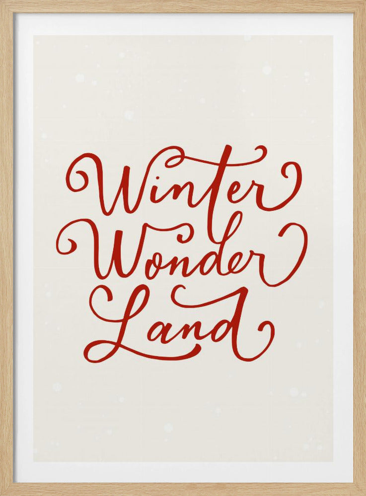 A holiday-themed art print with the words 'Winter Wonder Land' written in a flowing red script font on a speckled, off-white background, all enclosed within a simple black frame. Artwork