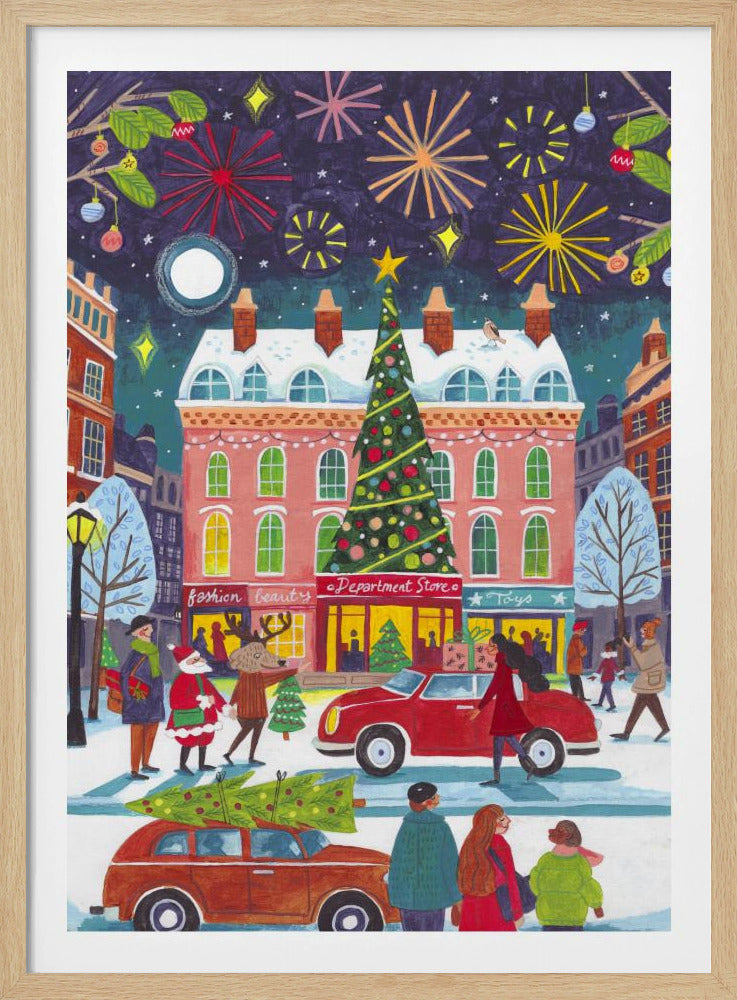 A whimsical illustration of a bustling city street at night during winter. The scene is festive, with a large decorated Christmas tree in front of a pink department store, fireworks lighting up the dark sky, and snow-covered streets filled with people, cars, Santa Claus, and a reindeer. Print