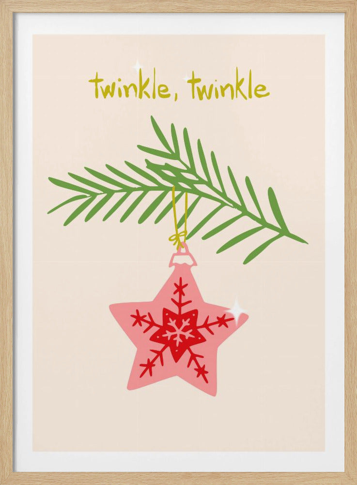 A framed piece of art with a light cream background featuring the words 'twinkle, twinkle' in a playful yellow-green font. Below the text, a pink star-shaped Christmas ornament with red snowflake designs hangs from a green pine branch. Print