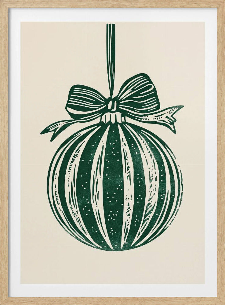 A vintage-style linocut print of a dark green Christmas bauble with a large bow, hanging against a cream background. The ornament features vertical stripes and white speckles, and the entire artwork is presented in a simple black frame. Artwork