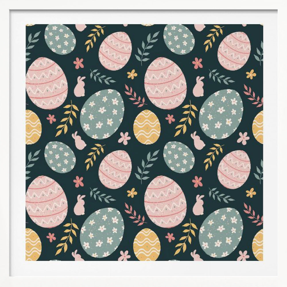 A framed piece of art with a repeating Easter pattern on a dark teal background. The pattern features decorated eggs in pink, light blue, and yellow, alongside small pink bunny silhouettes and colorful sprigs of leaves and flowers. Poster