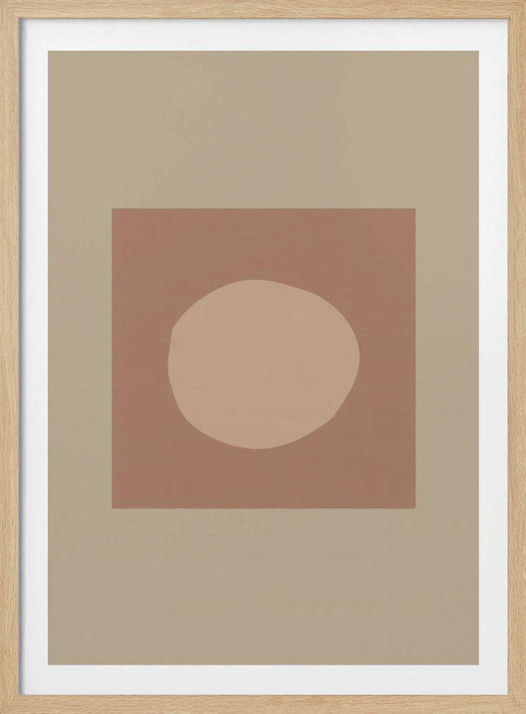A minimalist abstract art print featuring a soft, irregular light brown circle centered within a dusty rose square. The composition is set against a light beige background and presented in a simple black frame. Wall Art
