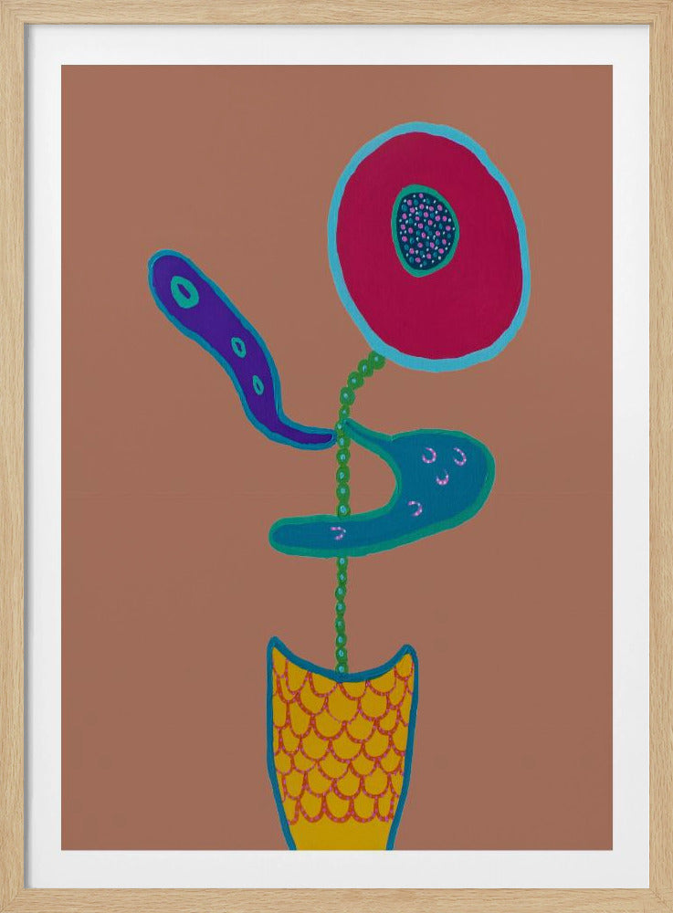 An abstract painting of a whimsical flower in a pot against a solid light brown background, enclosed in a black frame. The flower features a large, round magenta head with a turquoise outline and a dotted center. Its stem is a string of green beads, and it has two amoeba-like leaves, one purple and one turquoise. The pot is yellow with a red fish-scale pattern. Decor