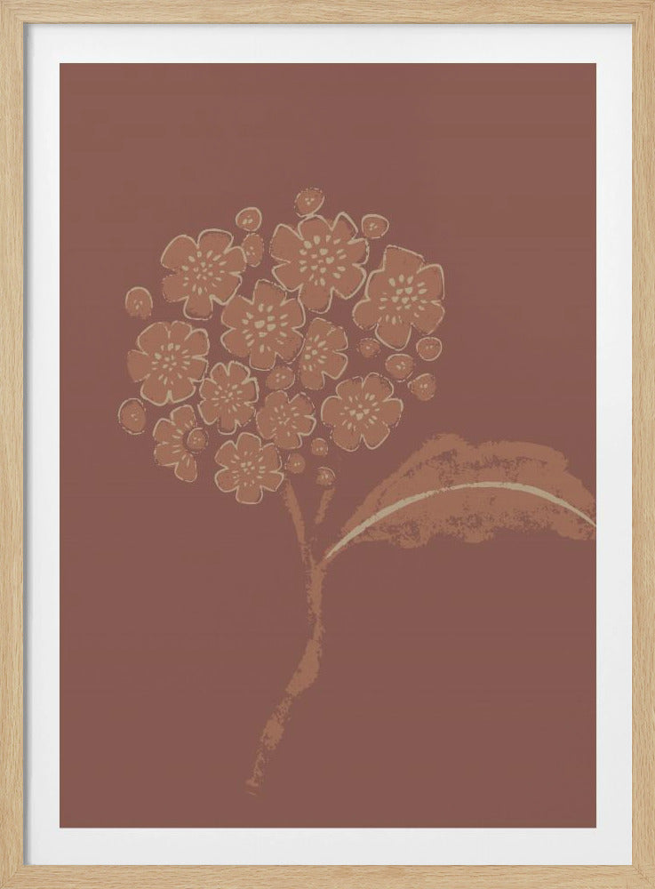 A stylized illustration of a single flower stalk with a round cluster of blossoms, similar to a hydrangea. The artwork is created in a limited palette of terracotta and cream against a solid dusty rose background, giving it a minimalist, block-print feel. The image is presented within a simple black frame. Decor