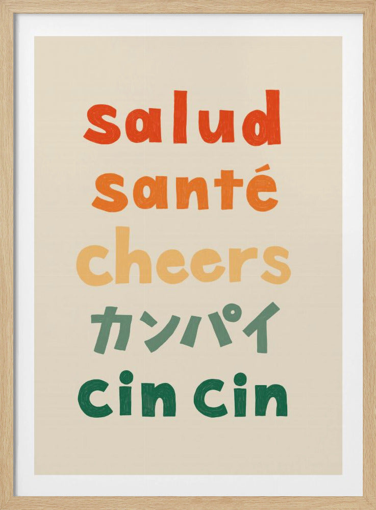 A framed art print with a cream background featuring the word 'cheers' in five different languages stacked vertically. From top to bottom, the words are 'salud' in red-orange, 'santé' in orange, 'cheers' in yellow-orange, 'カンパイ' in light green, and 'cin cin' in dark green, all in a bold, playful font. Wall Art