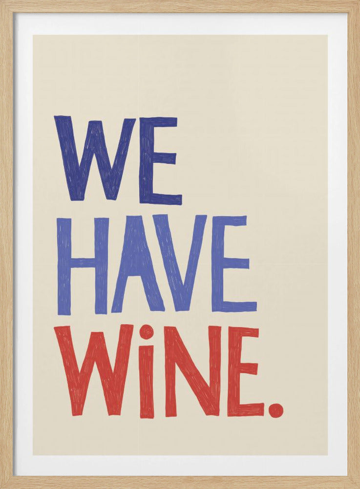 A framed typographic art print with the phrase 'WE HAVE WINE.' on a cream background. The words are stacked vertically, with 'WE' in dark blue, 'HAVE' in a lighter blue, and 'WINE.' in red, all in a hand-drawn, sans-serif font. Artwork