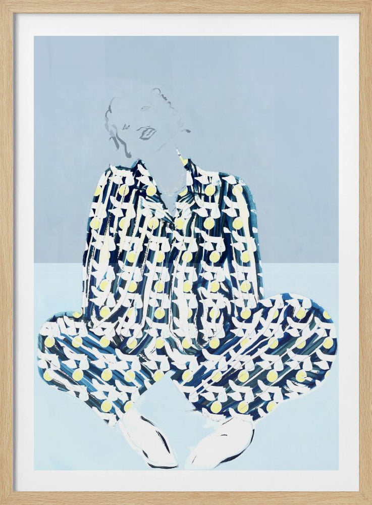 A framed fashion illustration of a person sitting cross-legged against a light blue background. The figure wears a bold, patterned blue, white, and yellow outfit, while their face and hair are rendered as faint, delicate line drawings. Wall Art