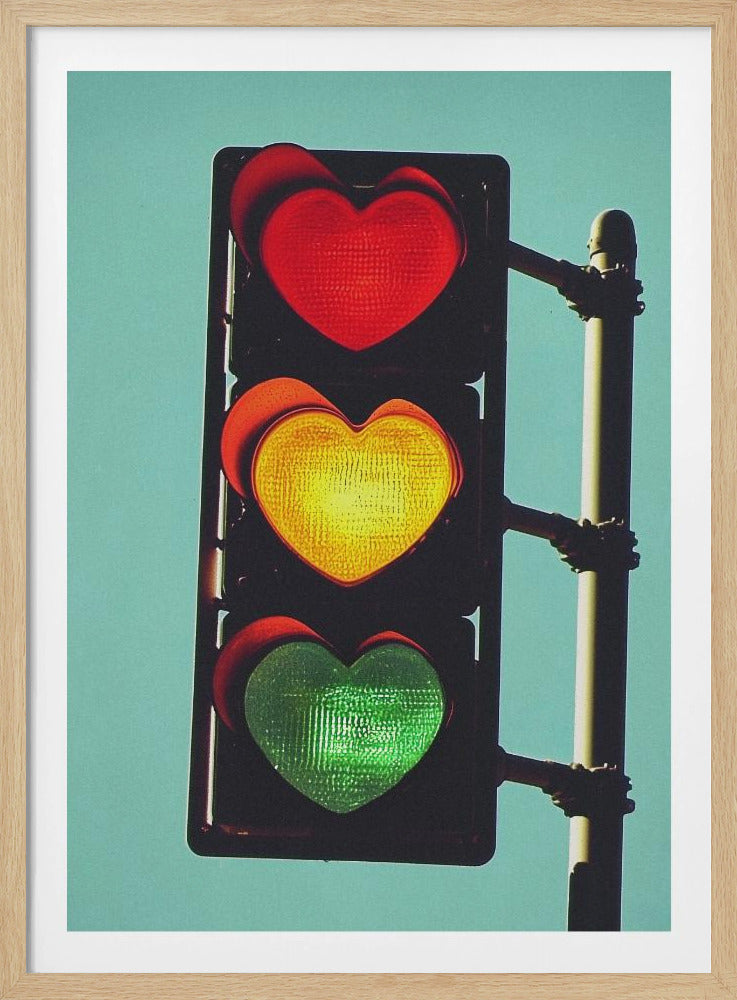 A vertical traffic light against a solid teal sky, with its red, yellow, and green signals all shaped like glowing hearts. Wall Art