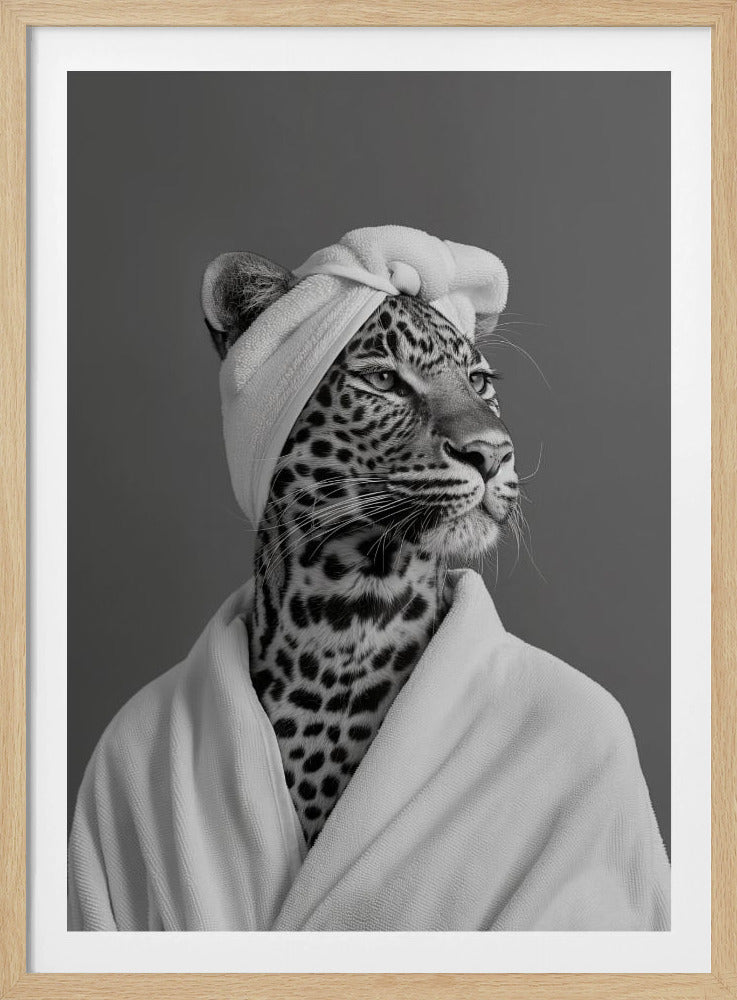 A humorous black and white portrait of a leopard wearing a white towel wrap on its head and a matching white bathrobe, looking off to the side against a solid gray background. Artwork