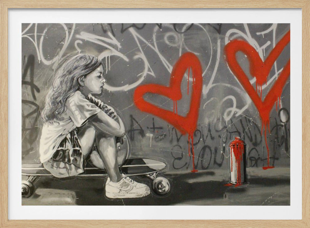 A monochrome street art painting of a young girl with long hair sitting thoughtfully on a skateboard. Behind her, a grey wall is covered in graffiti tags and two large, bright red hearts are spray-painted with drips running down. A red and white spray paint can sits on the ground next to her. Artwork