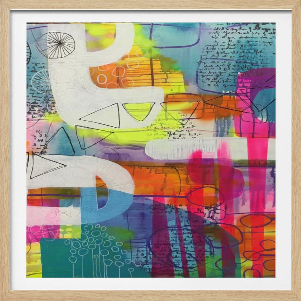 A vibrant and energetic abstract painting in a light wood frame. The multi-layered composition features bold white shapes, some resembling letters, over a colorful background of hot pink, turquoise, orange, and neon yellow. Black ink details include handwritten script, geometric shapes like triangles and wheels, and doodled patterns, creating a dynamic and complex visual texture. Artwork