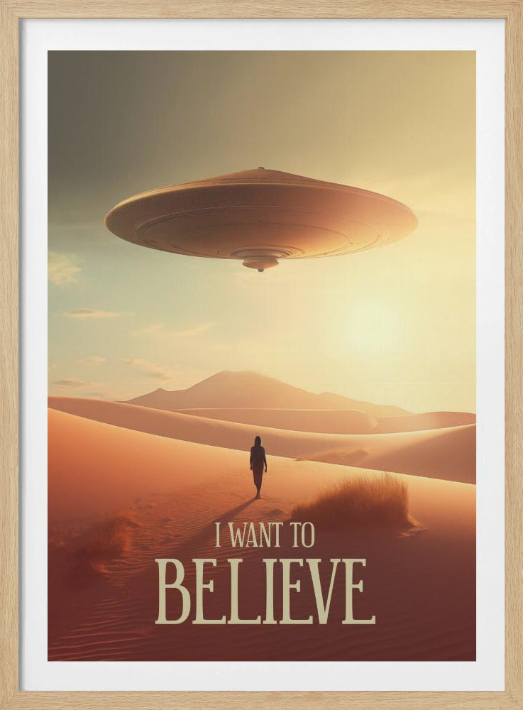 A sci-fi poster showing a large flying saucer hovering in the sky above vast orange sand dunes. A lone human silhouette walks in the desert below. At the bottom, the text reads 'I WANT TO BELIEVE'. Decor