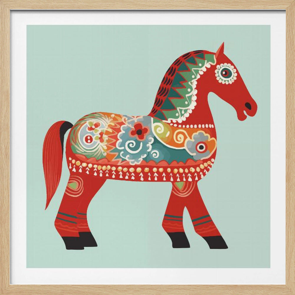 A folk art style illustration of a vibrant red horse, adorned with intricate, colorful patterns in green, orange, blue, and white. The horse stands against a plain, light blue background and is encased in a light wood frame. Decor